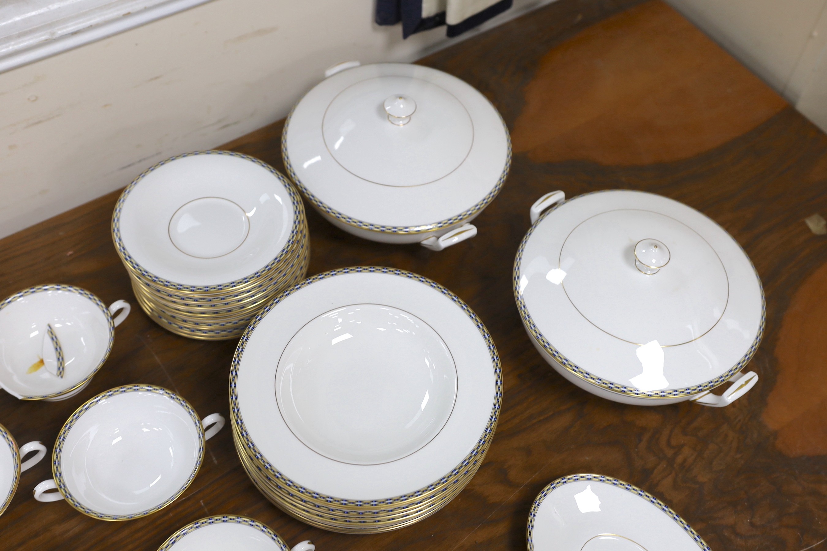 A Royal Worcester Francesca pattern dinner service, settings for 12 persons.